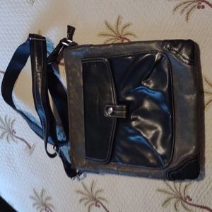 Cirque Du Soleil gray and navy crossbody.